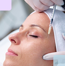 inyeccion en rostro de mujer